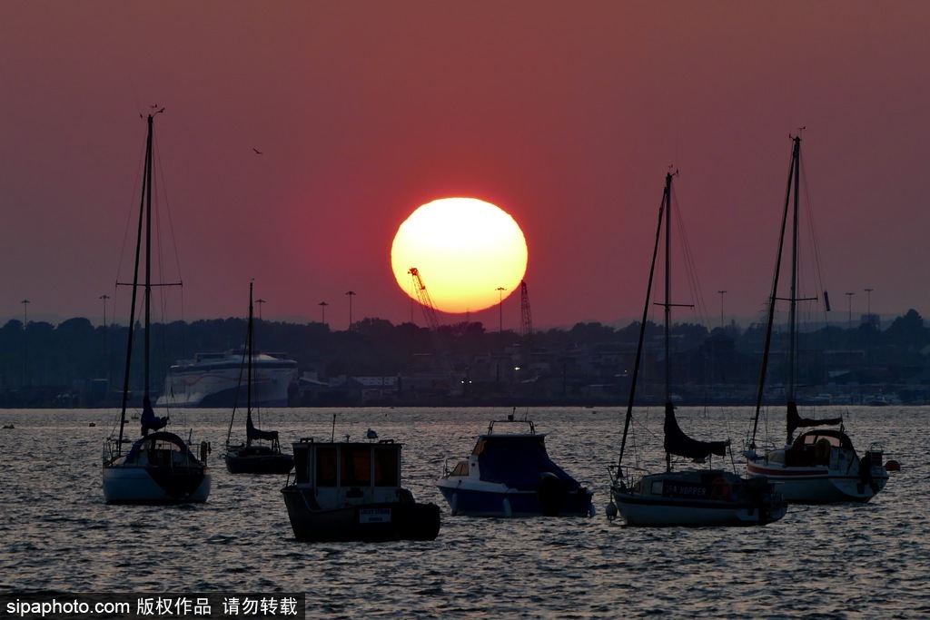 英國多塞特海邊落日 日光昏黃寧靜絕美